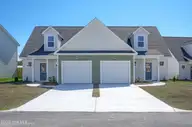 215 Sandpiper Place, Holly Ridge, NC 28445 — 3-bedroom townhome in Coastal Village, Holly Ridge, NC, photo 1 of 20: 213.215 Sand Piper - Exterior - Edited_2