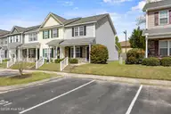 27 E Doris Avenue 111, Jacksonville, NC 28540 — 2-bedroom townhome in Doris Place, Jacksonville, NC, photo 4 of 29: 4_back exterior
