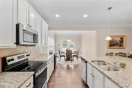418 Goldenleaf Circle, Whispering Pines, NC 28327 — 4-bedroom home in Summerfield at Arrowstone, Whispering Pines, NC, photo 17 of 47: kitchen