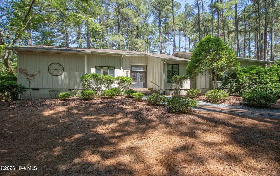 12 Whithorn Court, Pinehurst, NC 28374 — 3-bedroom home in Pinewild CC, Pinehurst, NC, photo 1 of 33: FrontExterior2