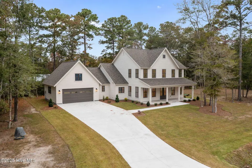135 Indian Trail, Beaufort, NC 28516 — 3-bedroom home in Indian Trace, Beaufort, NC, photo 1 of 66: 4-web-or-mls-DJI_0706