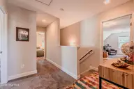 107 Village Drive, Holly Ridge, NC 28445 — 4-bedroom home in Coastal Village, Holly Ridge, NC, photo 21 of 77: Upstairs hall