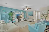 129 NE 13th Street, Oak Island, NC 28465 — 3-bedroom home, Oak Island, NC, photo 8 of 68: Living Room
