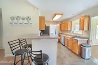 218 Oakmont Drive, Hampstead, NC 28443 — 3-bedroom waterfront home in Cross Creek, Hampstead, NC, photo 8 of 40