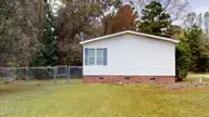 4100 Masonboro Loop Road, Wilmington, NC 28409 — 3-bedroom manufactured home in Navaho Woods, Wilmington, NC, photo 21 of 25: 4100-Masonboro-Loop-Rd-03252026_205546