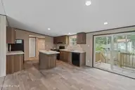 3080 Cross Street SW, Shallotte, NC 28470 — 3-bedroom manufactured home in Shell Point, Shallotte, NC, photo 13 of 35: Combination Dining Space