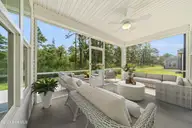 1067 Lexington Avenue NE, Leland, NC 28451 — 4-bedroom home in Parkwood Estates, Leland, NC, photo 24 of 32: Back Porch