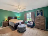 610 Wolverine Place, Jacksonville, NC 28546 — 3-bedroom home in Fox Run, Jacksonville, NC, photo 19 of 43: Primary Bedroom