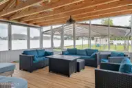 705 Plowshare Court, Maysville, NC 28555 — 3-bedroom home in Batchelors Cove, Maysville, NC, photo 22 of 36: Screened & Covered Back Porch 2