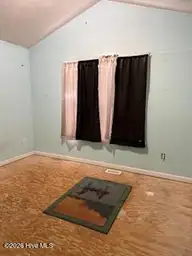 623 Trevis Lane, Wilmington, NC 28412 — 4-bedroom home in Roland Place, Wilmington, NC, photo 5 of 19: Front bed room
