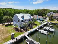 907 Radnor Road, Wilmington, NC 28409 — 4-bedroom waterfront home in Inlet Watch, Wilmington, NC, photo 1 of 55: 907RadnorRdAerials-108