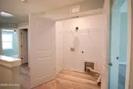 427 Sunfish Lane, Sneads Ferry, NC 28460 — 2-bedroom townhome in Beachside Commons, Sneads Ferry, NC, photo 13 of 27: 2nd Floor Hall Laundry