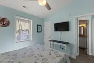 828 /102 N New River Drive 102, Surf City, NC 28445 — 4-bedroom waterfront townhome in Carolina Shores, Surf City, NC, photo 13 of 39: 28-web-or-mls-425A6548