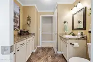 2009 Johnson Road, Elizabeth City, NC 27909 — 3-bedroom home in Hickory Acres, Elizabeth City, NC, photo 6 of 49: Hall Half Bath