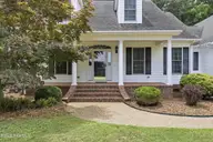 209 Small Drive, Elizabeth City, NC 27909 — 3-bedroom waterfront home in Newbegun Land, Elizabeth City, NC, photo 2 of 39: Front close-up