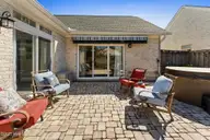 1013 Garden Club Way, Leland, NC 28451 — 3-bedroom home in Waterford of the Carolinas, Leland, NC, photo 20 of 34: Back Patio