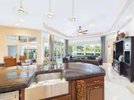 8900 Mahogany Run, Wilmington, NC 28411 — 3-bedroom home in Porters Neck Plantation, Wilmington, NC, photo 21 of 75: 32-web-or-mls-33_STILL108_kitchen-to-gre