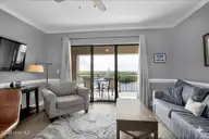 106 N Water Street 907, Wilmington, NC 28401 — 1-bedroom condo in Water Street Center Condo, Wilmington, NC, photo 7 of 34: Living Room - Balcony