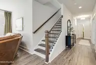 9096 Village Lake Drive SW, Calabash, NC 28467 — 5-bedroom home in Devaun Park, Calabash, NC, photo 24 of 46: Staircase to 2nd Floor