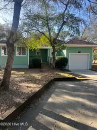 44 Pinehurst Drive, Oak Island, NC 28465 — 2-bedroom home in Caswell Dunes, Oak Island, NC, photo 1 of 14: FRONT