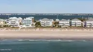 2905 Pointe West Drive 5b2, Emerald Isle, NC 28594 — 2-bedroom waterfront condo in Pier Pointe, Emerald Isle, NC, photo 2 of 28: 15-web-or-mls-DJI_20251215104300_0102_D