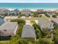 1625 S Shore Drive, Surf City, NC 28445 — 2-bedroom waterfront home in White Hills Beach, Surf City, NC, photo 2 of 32: 9-web-or-mls-DJI_20250729132326_0128_D