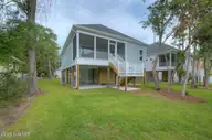 168 NE 31st Street, Oak Island, NC 28465 — 3-bedroom home in Tranquil Harbor, Oak Island, NC, photo 10 of 67: DSC 1522 3 4 Enhancer-039-028-1500x998