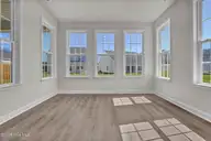 3343 Grand Park Way, Leland, NC 28451 — 4-bedroom home in Grand Park, Leland, NC, photo 15 of 35: Sunroom