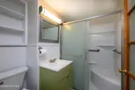 2207 Woodland Avenue, New Bern, NC 28560 — 3-bedroom home in Trent Park, New Bern, NC, photo 11 of 35: Bathroom off Dining