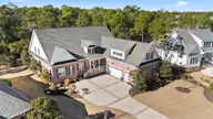 3992 Wyndmere Drive, Southport, NC 28461 — 5-bedroom home in St James, Southport, NC, photo 2 of 74: DJI_20251216133127_0493_D