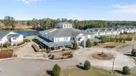 490 Little River Farm Boulevard 101a, Carthage, NC 28327 — 2-bedroom condo in Little River Fa, Carthage, NC, photo 5 of 19: 490 LRFB 101-102A cluhouse & bldg