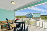 491 Ocean Boulevard W, Holden Beach, NC 28462 — 4-bedroom waterfront home in Holden Beach, Holden Beach, NC, photo 9 of 47: 491 Ocean Blvd W