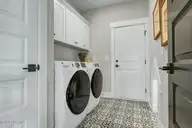 591 Heart Pine Avenue, Wilmington, NC 28411 — 4-bedroom home in Indigo at Abbey Preserve, Wilmington, NC, photo 20 of 31: Laundry Room - Nantanaha - Cottages at B