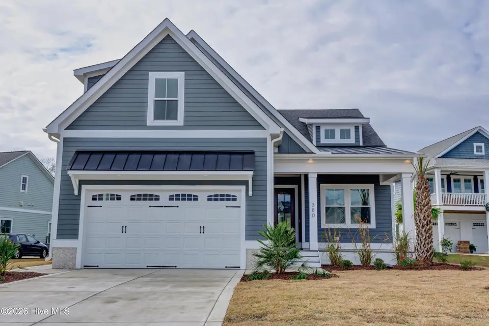 108 Whispering Pine Lane, Holly Ridge, NC 28445 — 4-bedroom waterfront home in Summerhouse On Everett Bay, Holly Ridge, NC, photo 1 of 52