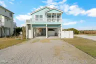 3505 Island Drive, North Topsail Beach, NC 28460 — 3-bedroom waterfront home in Seahaven Beach, North Topsail Beach, NC, photo 1 of 59: 3505IslandDr-9