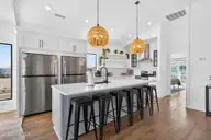 381 E Fourth Street, Ocean Isle Beach, NC 28469 — 5-bedroom waterfront home in Little Beach Landing, Ocean Isle Beach, NC, photo 12 of 62: 381 E Fourth Street