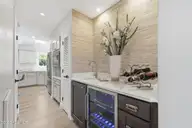 119 Pine Bluff Drive, Morehead City, NC 28557 — 3-bedroom waterfront home in Brandywine Bay, Morehead City, NC, photo 17 of 67: Wine & Beverage Bar