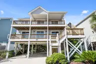 1417 N Topsail Drive, Surf City, NC 28445 — 4-bedroom waterfront home in Del Mar Beach, Surf City, NC, photo 2 of 56: 2-web-or-mls-01