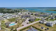 650 Cedar Point Boulevard C11, Cedar Point, NC 28584 — 2-bedroom waterfront condo in Cedar Point Villas, Cedar Point, NC, photo 2 of 50: 11-web-or-mls-DJI_20260901135706_0051_D
