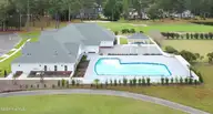 2201 Wild Indigo Circle NW Lot 64, Calabash, NC 28467 — 3-bedroom townhome in Brunswick Plantation, Calabash, NC, photo 14 of 21: BrunswickPlantationDrone-Pool(s)