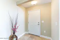 103 E Chelsea Court, Southern Pines, NC 28387 — 2-bedroom condo in Mid South Club, Southern Pines, NC, photo 3 of 54: Foyer