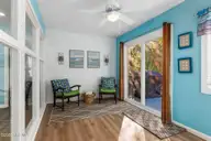144 Salter Path Road, Pine Knoll Shores, NC 28512 — 3-bedroom home in Piksco, Pine Knoll Shores, NC, photo 15 of 47: Sun Porch