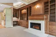 60 Lake Dornoch Drive, Pinehurst, NC 28374 — 4-bedroom waterfront home in CCNC, Pinehurst, NC, photo 22 of 70: Family Room Fireplace