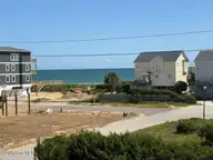 711 N Topsail Drive, Surf City, NC 28445 — 3-bedroom waterfront townhome in Dune Ridge, Surf City, NC, photo 3 of 65: 711 view