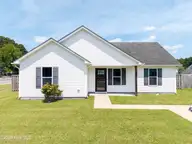 143 Sutton Drive, Elizabeth City, NC 27909 — 3-bedroom home in Carolina Village, Elizabeth City, NC, photo 2 of 18: 143 Sutton Drive Front of Home