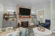 127 Sound Point Drive, Harkers Island, NC 28531 — 4-bedroom home in Cape Point Village, Harkers Island, NC, photo 13 of 56: Living room view 2