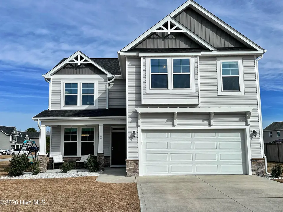 1001 Ferry Spring Lane, Jacksonville, NC 28546 — 4-bedroom home in Towne Pointe, Jacksonville, NC, photo 1 of 53: Front