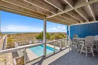608 N Carolina Beach Avenue N Unit 1b, Carolina Beach, NC 28428 — 3-bedroom waterfront condo in Reefs, Carolina Beach, NC, photo 1 of 27: photo_01
