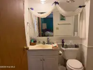 245 Lake Drive SW, Supply, NC 28462 — 3-bedroom waterfront manufactured home in Riverside, Supply, NC, photo 11 of 27