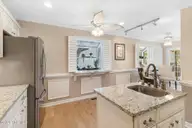 106 Cherry Court, Pine Knoll Shores, NC 28512 — 3-bedroom waterfront home in Pine Knoll Association, Pine Knoll Shores, NC, photo 16 of 63: Kitchen with Garden Windwo